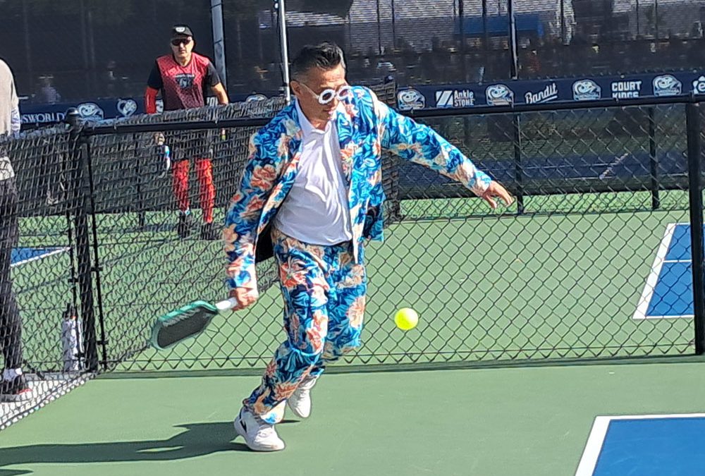 Through Positivity and Flamboyant Suits, Johnny Pickles Spread Happiness at Nationals